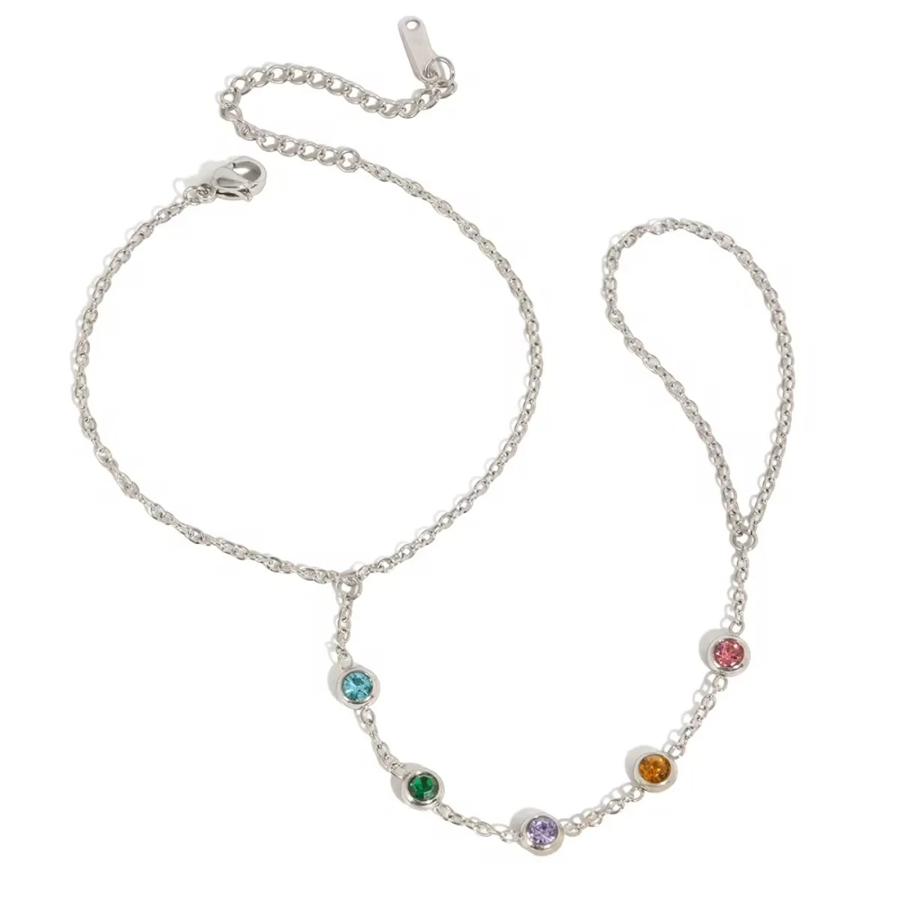 Celeste Glow – Ατσάλινο Hand Chain με πολύχρωμα Ζιργκόν.