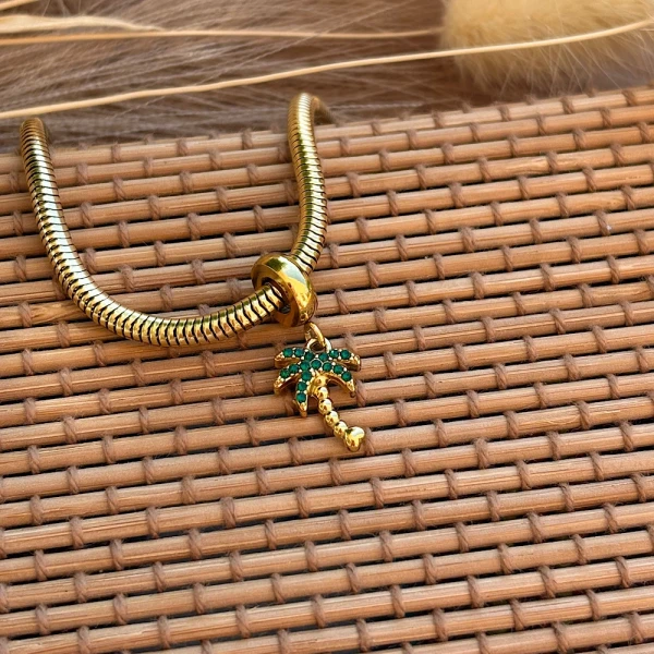 Επιχρυσωμένο ατσάλινο σύμβολο-στοιχείο Φοίνικας.