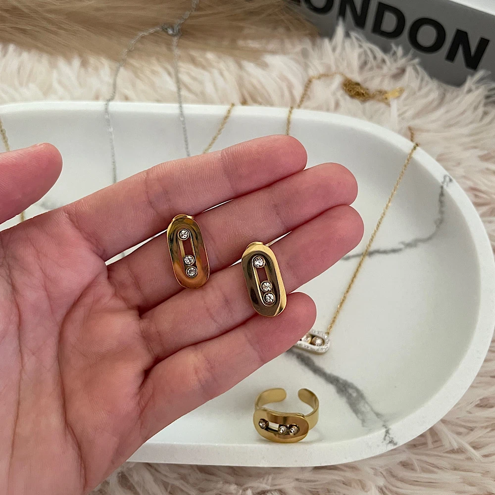 Glint Capsule Earrings-Steel earrings. Glint Capsule Earrings-Steel earrings.