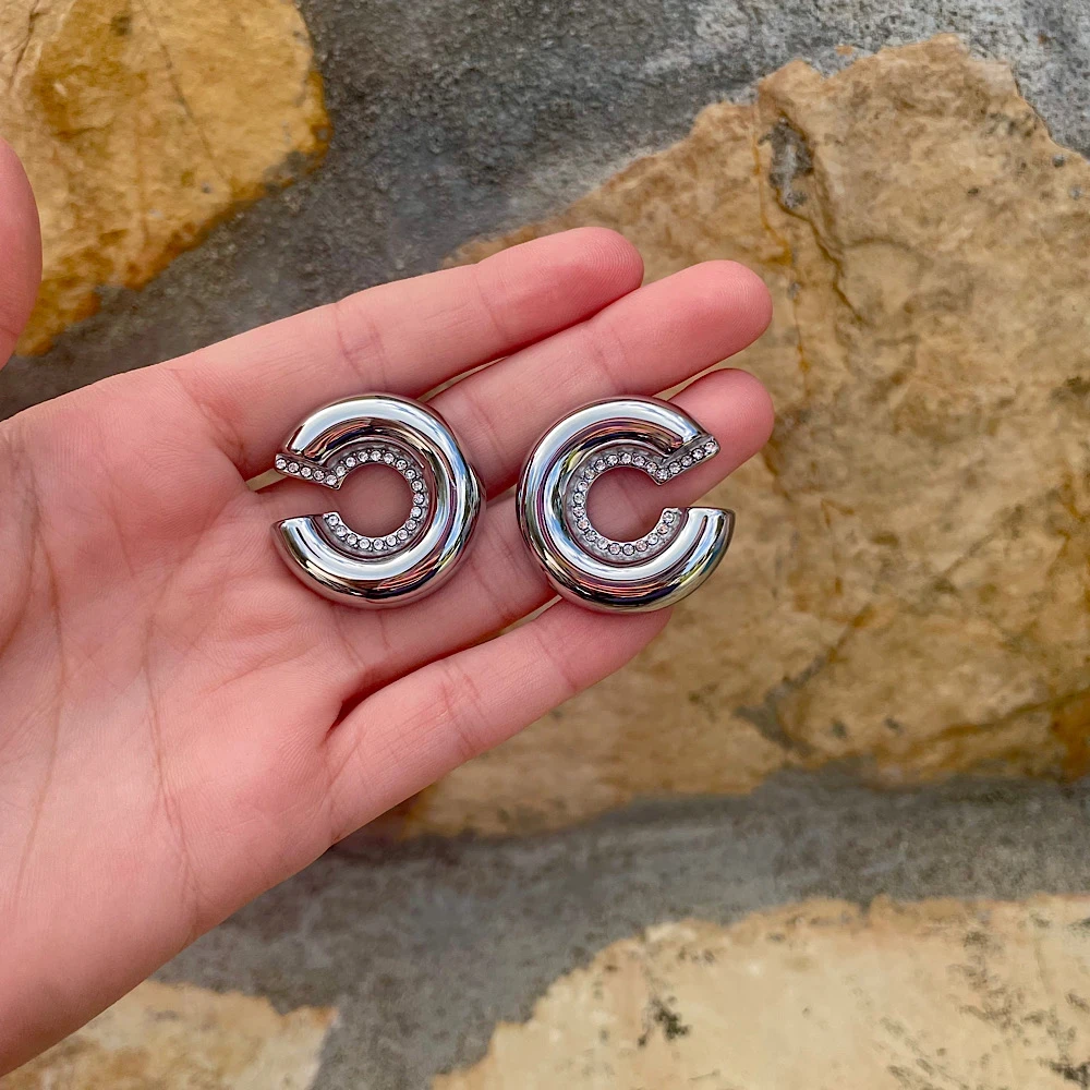 Lunar Loop-Steel earrings.(ασημί) Lunar Loop-Steel earrings.(ασημί)