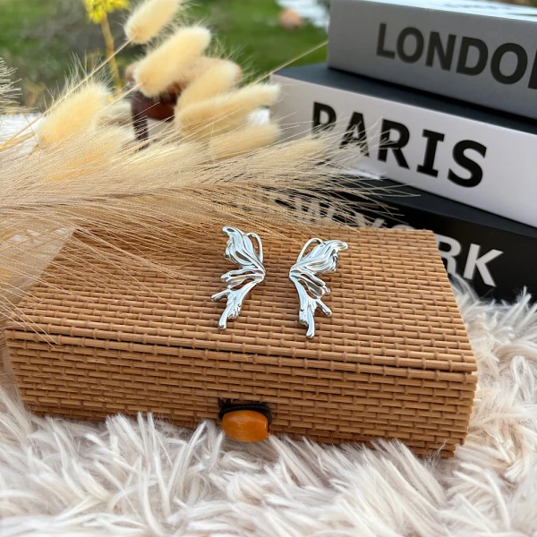 Melted Wings – Ατσάλινα Σκουλαρίκια Πεταλούδα.